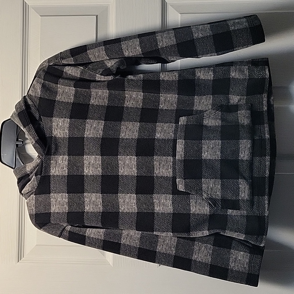 Boys hooded fleece pullover with kangaroo pocket.Size medium (7-8)